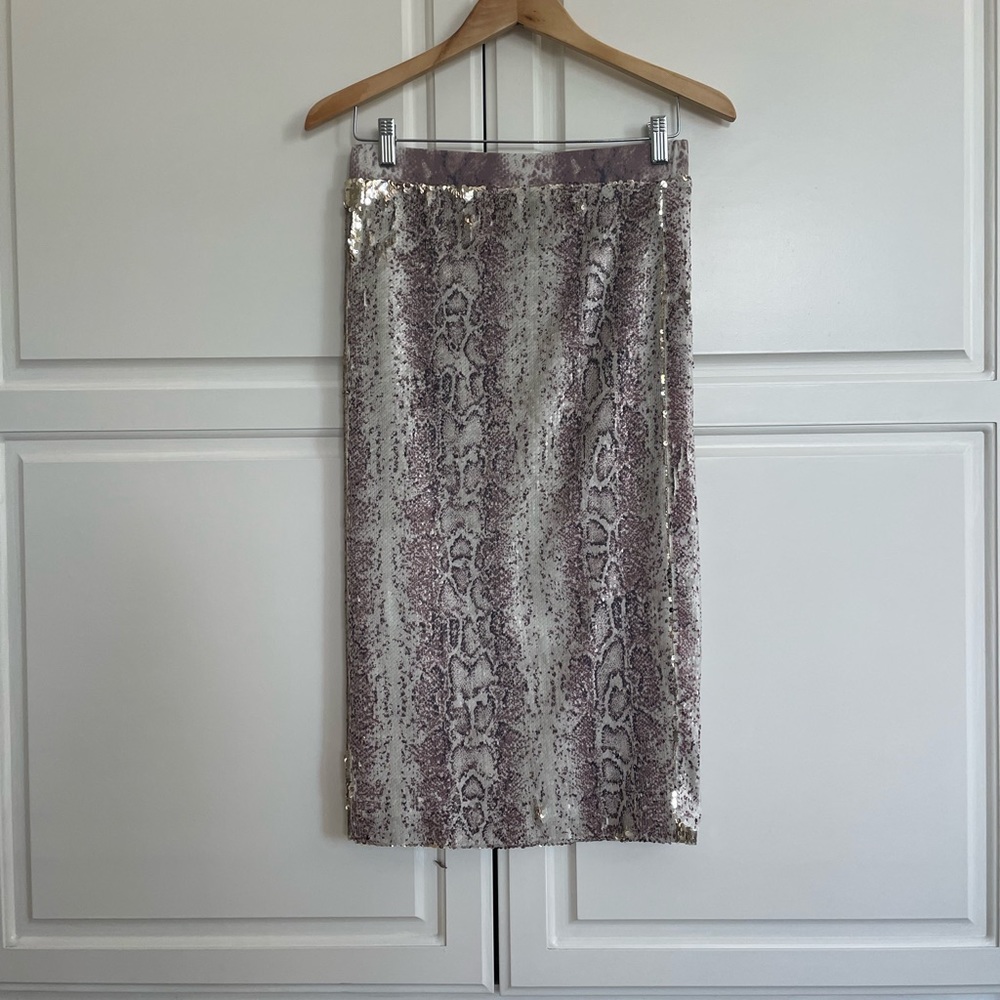A gold sequin snake print pencil skirt